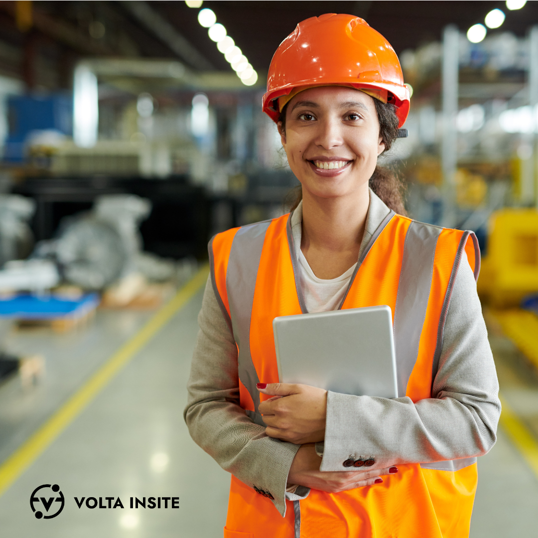 Embrace Predictive Maintenance in Your Industrial Facility for Peace of Mind - happy woman holding iPad